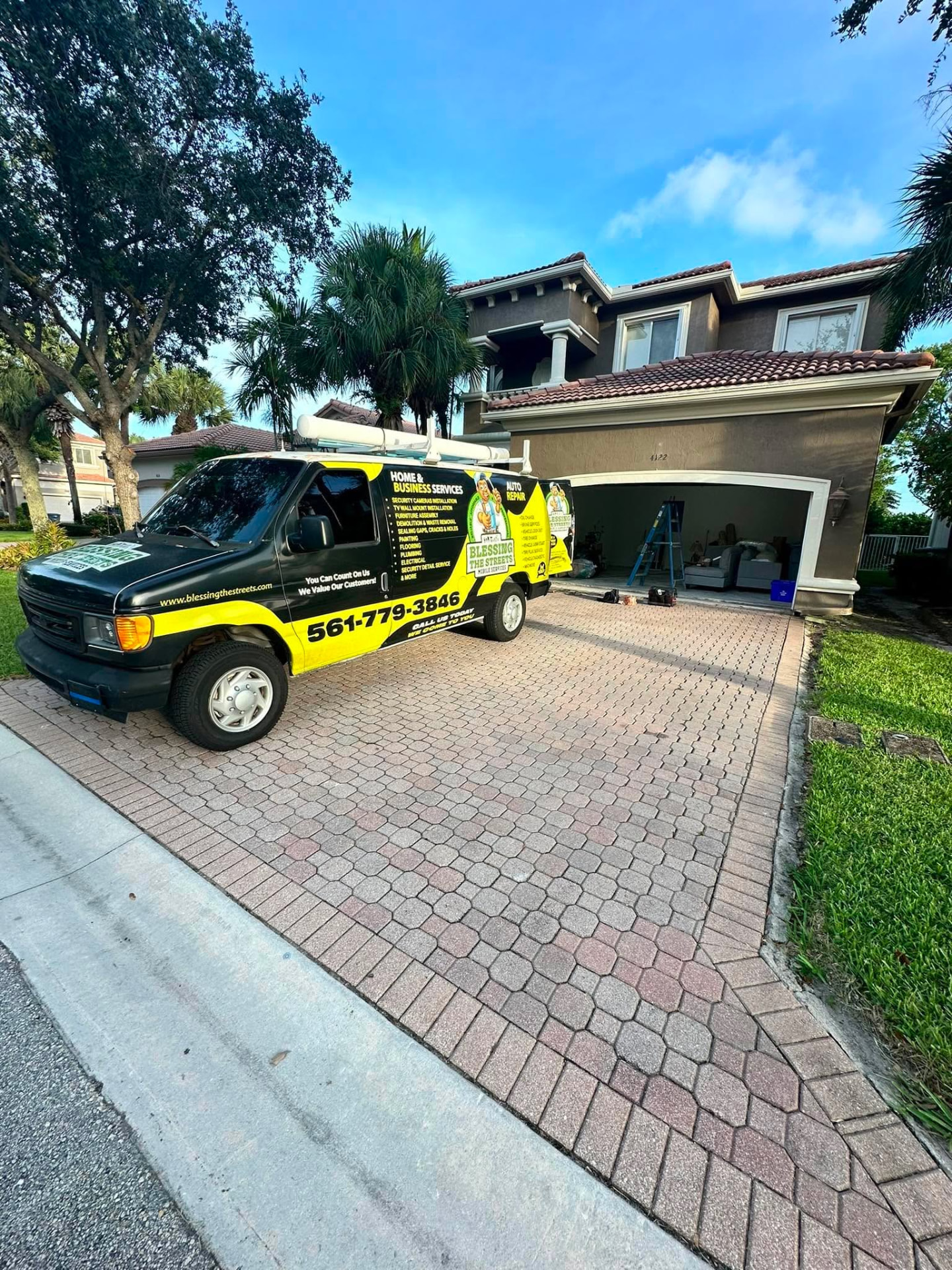 Blessing The Streets mobile renovation van at a residential project